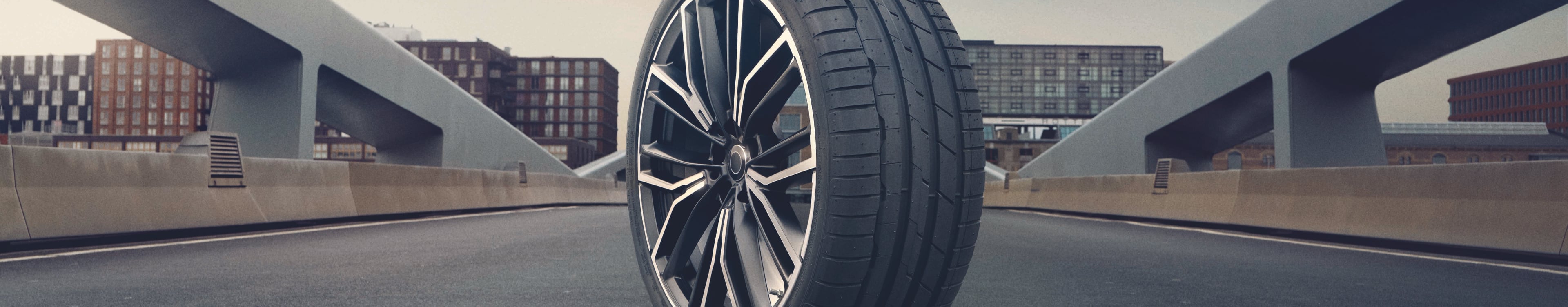 Single Hankook Tire wheel on an open road